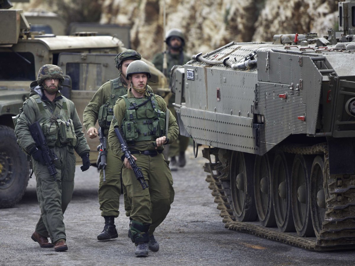 Israeli soldiers secure the Israel-Lebanon border on January 28, 2015. (Ariel Schalit/AP)