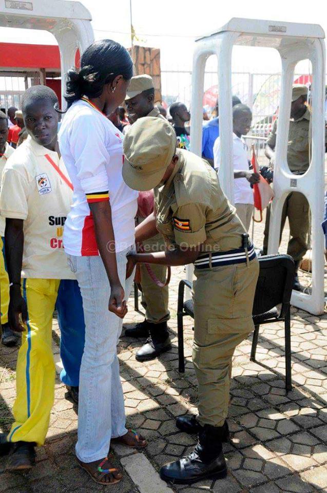 PHOTOS of Ugandan Police Fondling Women in the Name of 